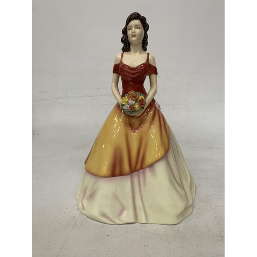 719 - A BOXED ROYAL DOULTON FIGURE FROM THE PRETTY LADIES COLLECTION 