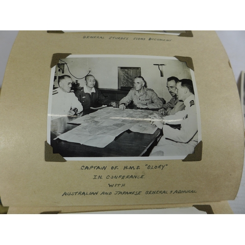 320A - A WORLD WAR II PHOTOGRAPH ALBUM CONTAINING PHOTOGRAPHS OF THE JAPANESE SIGNING OF THE INSTRUMENT OF ... 