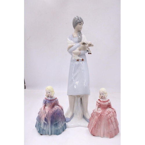 117 - A LLADRO STYLE LADY FIGURE HOLDING A LAMB 38CM TALL, PLUS TWO ROYAL DOULTON STYLE FIGURES