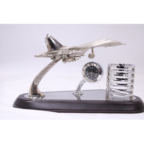 122 - AN F15 DESKTOP MODEL AIRCRAFT PLANE, CLOCK AND PEN HOLDER