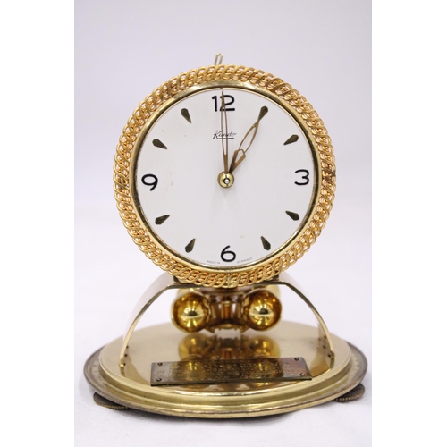 123 - A 1961 GLASSED DOME KUNDO GERMAN PRESENTATION CLOCK