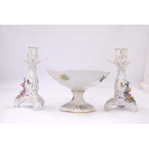 128 - A VINTAGE FLORAL COMPOTE PLUS A PAIR OF PORCELAIN CANDLESTICKS