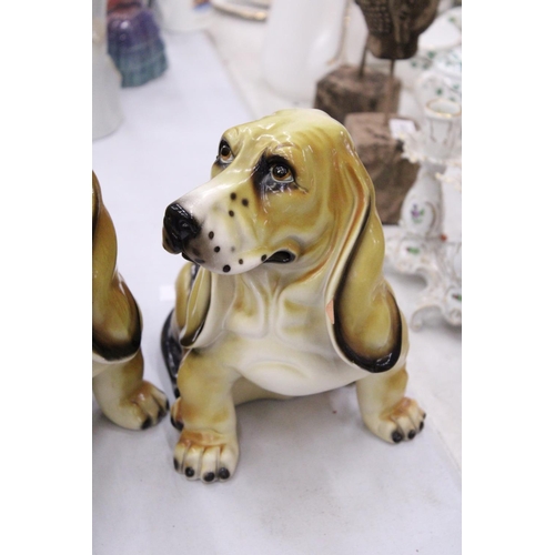 137 - A PAIR OF CERAMIC BEAGLE DOG FIGURES - APPROXIMATELY 26CM TALL