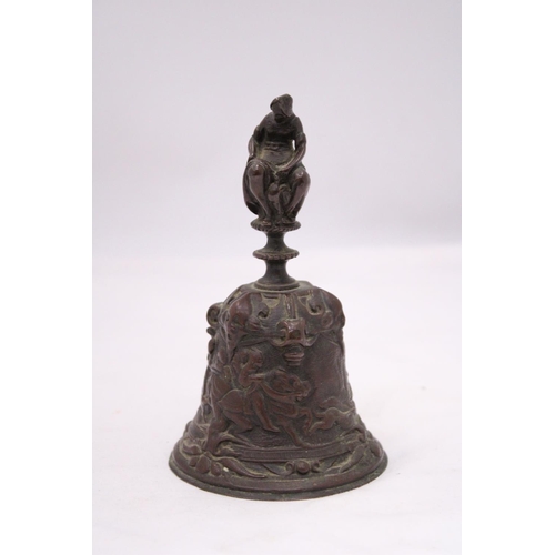 149 - A ORIENTAL BRONZE BELL DEPICTING A HUNTING SCENE AROUND BASE OF BELL