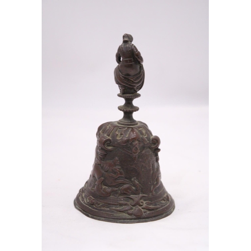 149 - A ORIENTAL BRONZE BELL DEPICTING A HUNTING SCENE AROUND BASE OF BELL