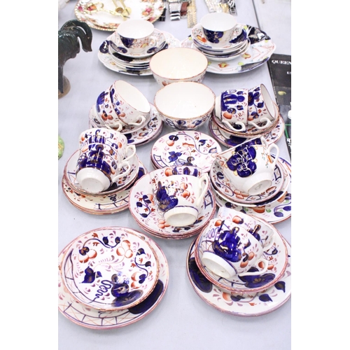 155 - A LARGE QUANTITY OF VINTAGE GAUDY WELSH TEAWARE TO INCLUDE CAKE PLATES, SUGAR BOWLS, CUPS, SAUCERS A... 