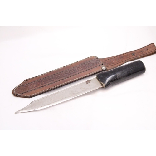 172 - AN OLD KNIFE IN LEATHER SHEATH