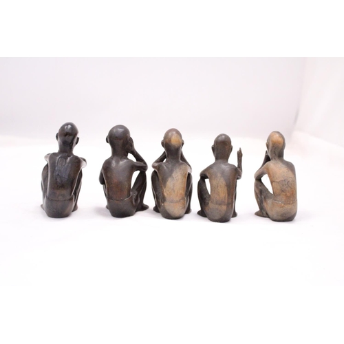 174 - A COLLECTION OF FIVE VINTAGE WOODEN AFRICAN FIGURES