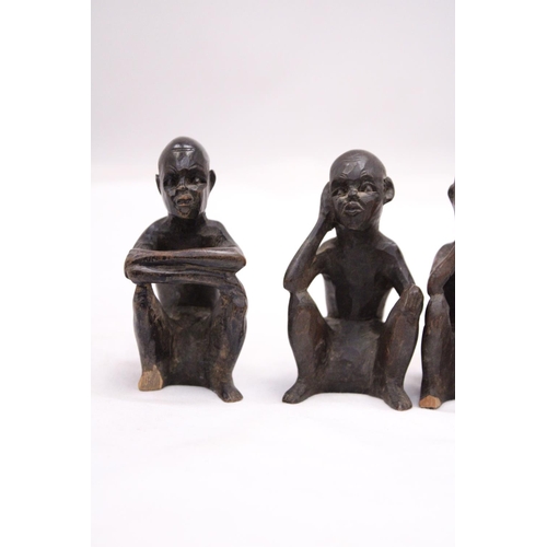 174 - A COLLECTION OF FIVE VINTAGE WOODEN AFRICAN FIGURES