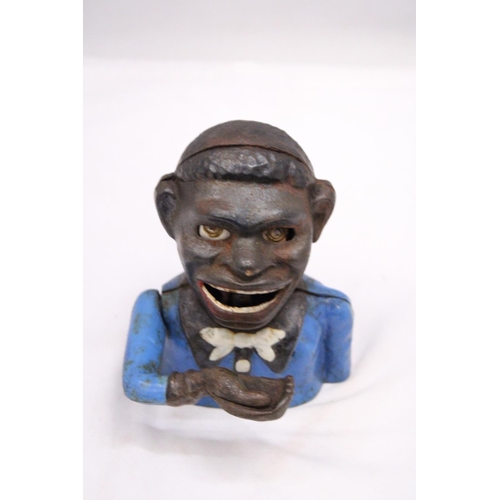 176 - A VINTAGE CAST IRON AFRICAN AMERICAN MECHANICAL BANK