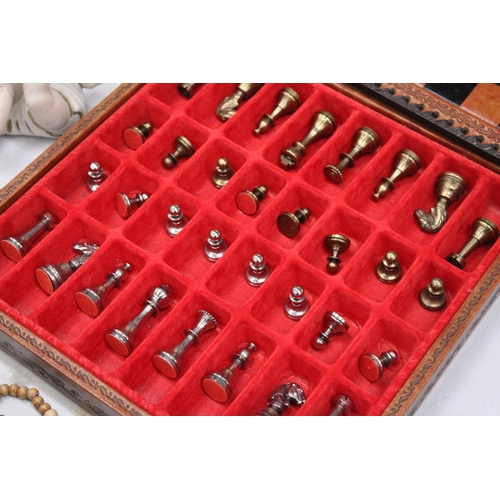 181 - A LEATHERBOUND CHESS BOARD WITH METAL CHESS PIECES - COMPLETE