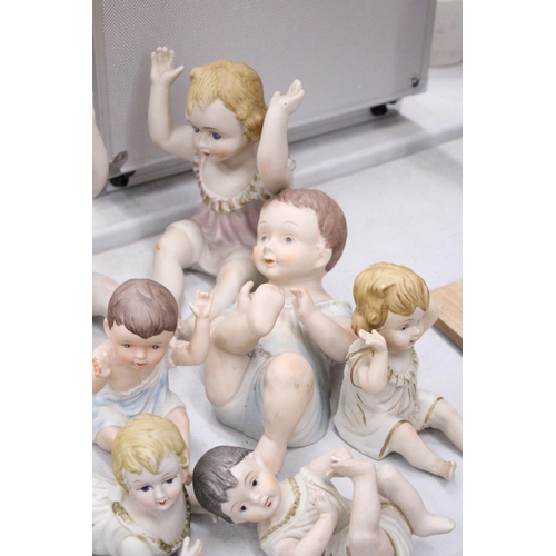 182 - THREE LARGE AND FOUR SMALL ANTIQUE PORCELAIN, BISQUE DOLLS