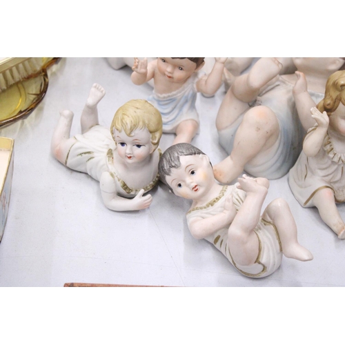 182 - THREE LARGE AND FOUR SMALL ANTIQUE PORCELAIN, BISQUE DOLLS