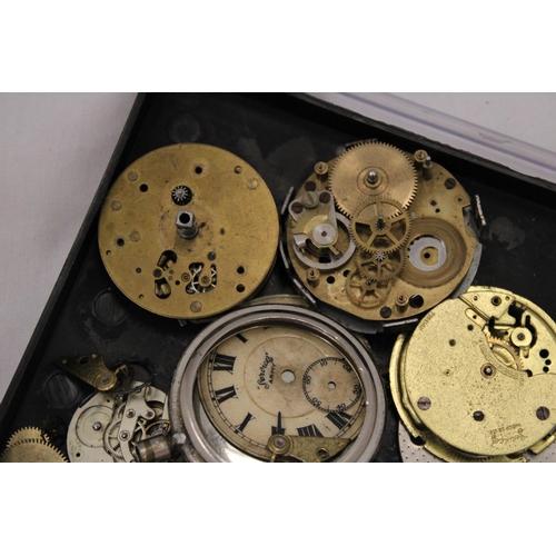 240 - A QUANTITY OF WATCH PARTS IN CASE