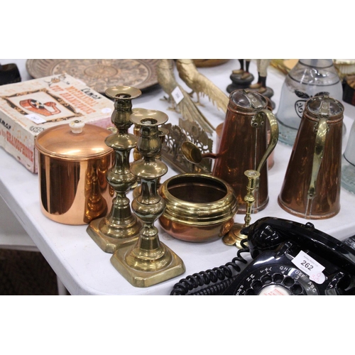 265 - A MIXED LOT OF COPPER AND BRASSWARE TO INCLUDE CANDLE STICKS, WATERING CAN ETC