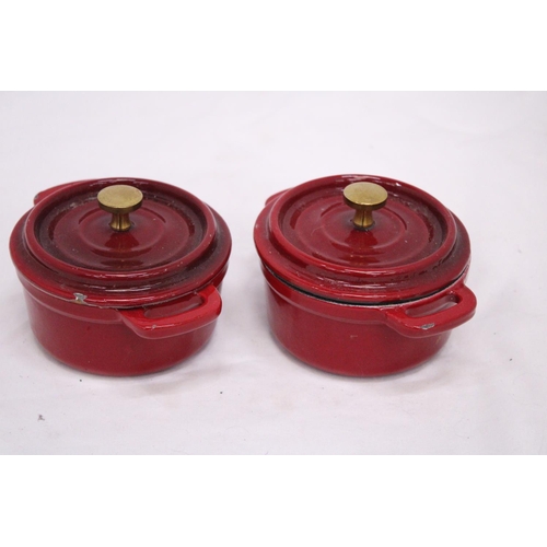 279 - TWO MINI CAST IRON LIDDED COOKING POTS