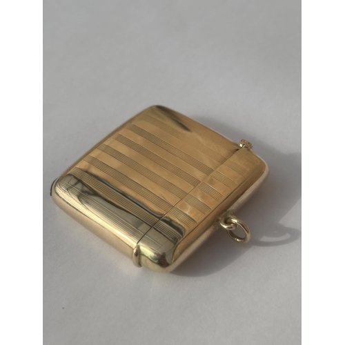 510A - A 9CT GOLD FULLY HALLMARKED ENGINE TURNED VESTA CASE WITH FLIP TOP COVER & SUSPENSION LOOP WEIGHT 21... 