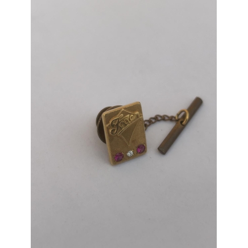 514A - A HALLMARKED 9CT GOLD DIAMOND AND RUBY FODEN TRUCKS PIN BADGE GROSS WEIGHT 4.84 G