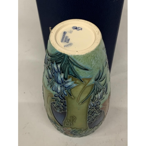 749 - A BOXED MOORCROFT VASE 