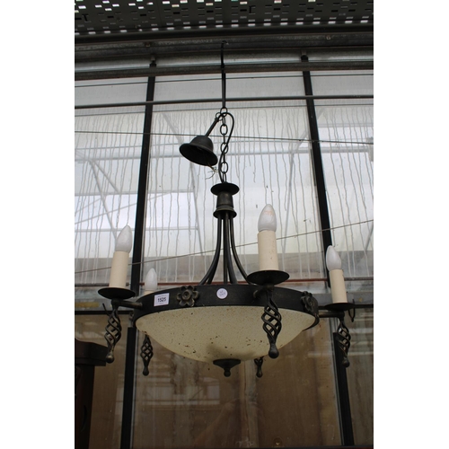 1525 - A DECORATIVE WROUGHT IRON FIVE BRANCH CIELING LIGHT FITTINGS WITH GLASS BOWL SHADE