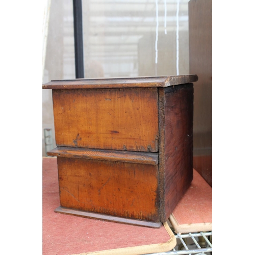 1553 - A VINTAGE MINIATURE OAK CHEST OF TWO DRAWERS WITH BRASS HANDLES