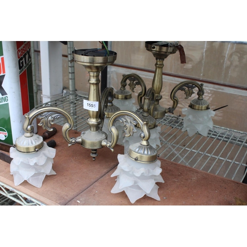 1555 - A PAIR OF BRASS EFFECT CIELING LIGHT FITTINGS WITH GLASS SHADES