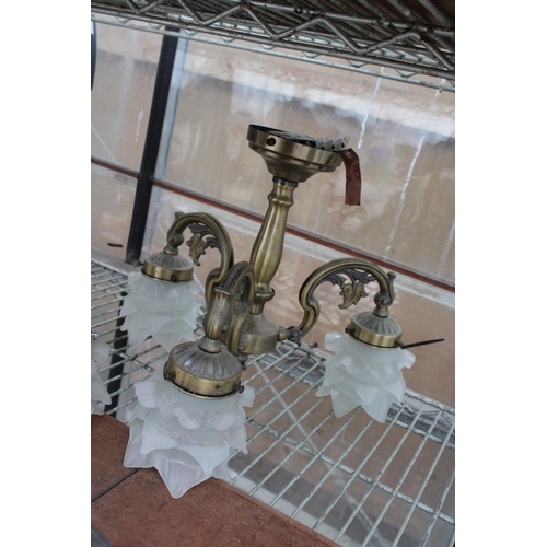 1555 - A PAIR OF BRASS EFFECT CIELING LIGHT FITTINGS WITH GLASS SHADES