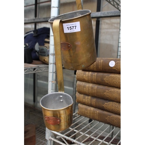 1577 - TWO VINTAGE BRASS MEASURING SCOOPS TO INCLUDE A 1L AND A 0.25L