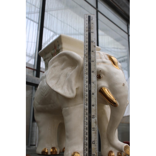 1588 - A DECORATIVE CERAMIC ELEPHANT JARDINAIRE STAND