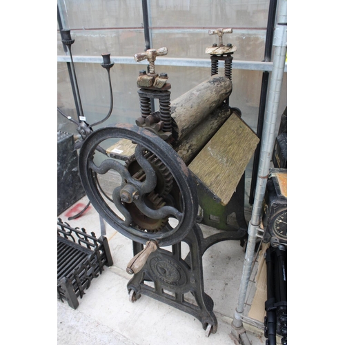 1606 - A VINTAGE CAST IRON AND WOODEN MANGLE BEARING THE NAME 'THE HERO MACHINE'