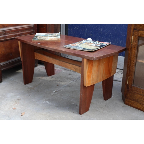 2504 - A GORDON WARR CONTRASTING HARDWOOD COFFEE TABLE AND AN OAK CORNER CABINET