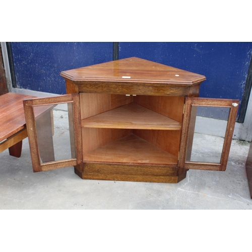 2504 - A GORDON WARR CONTRASTING HARDWOOD COFFEE TABLE AND AN OAK CORNER CABINET