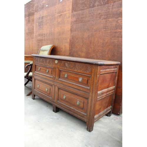 2505 - A GEORGE III OAK BLANKET CHEST WITH CARVED FRIEZE AND 4 SHAM DRAWERS, 52