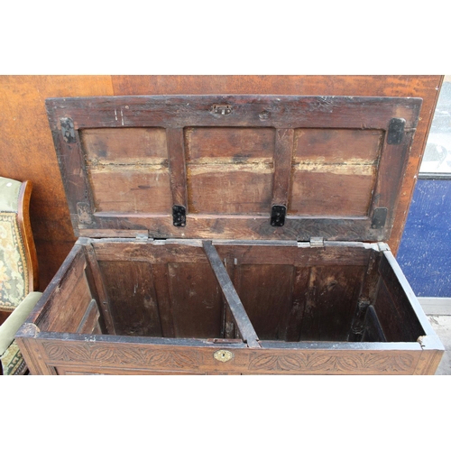 2505 - A GEORGE III OAK BLANKET CHEST WITH CARVED FRIEZE AND 4 SHAM DRAWERS, 52