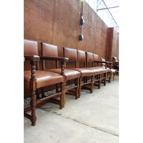 2510 - A SET OF 6 OAK JACOBEAN STYLE DINING CHAIRS WITH LEATHER SEATS AND LEATHER STUDDED BACKS ON TURNED L... 