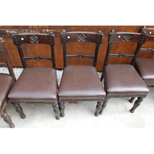 2522 - A SET OF 8 VICTORIAN OAK DINING CHAIRS WITH CARVED TOP RAIL ON TURNED AND FLUTED LEGS