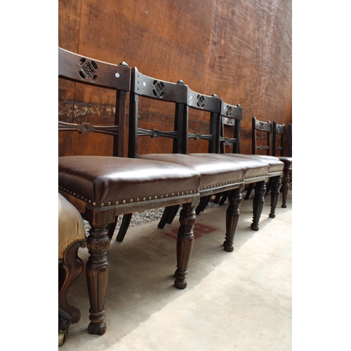 2522 - A SET OF 8 VICTORIAN OAK DINING CHAIRS WITH CARVED TOP RAIL ON TURNED AND FLUTED LEGS