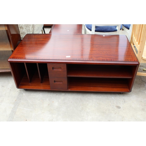 2549 - A RETRO MAHOGANY AND CROSSBANDED MEREDEW COFFEE TABLE ENCLOSING DRAWERS, RECORD RACK AND SHELF, 48