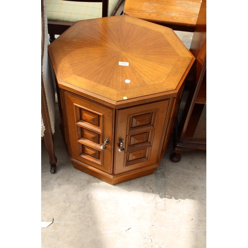 2551 - A MODERN OCTAGONAL A.S.F. & CO CUPBOARD WITH INLAID TOP AND PANELLED DOORS, 24