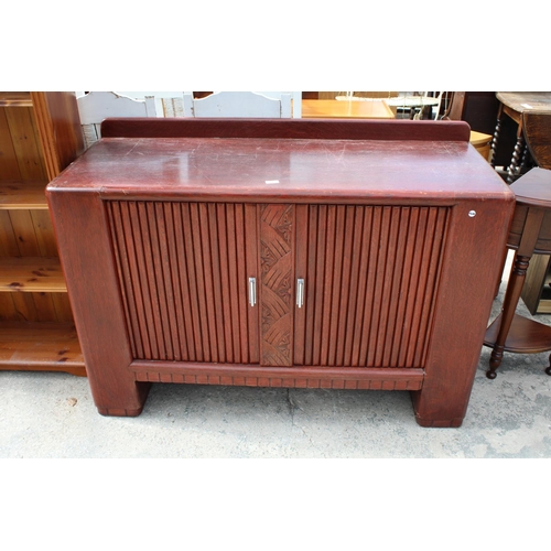 2565 - A MID 20TH CENTURY OAK SIDEBOARD WITH TAMBOUR DOORS, 54