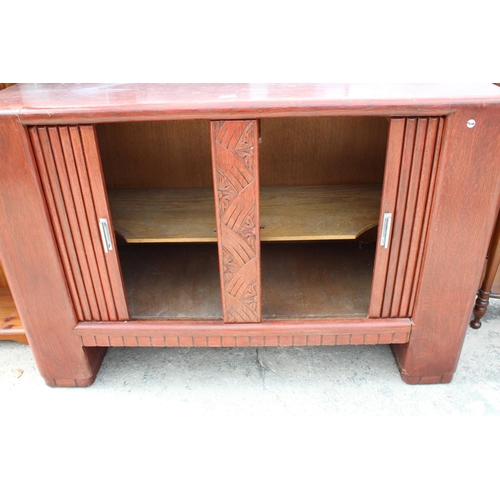 2565 - A MID 20TH CENTURY OAK SIDEBOARD WITH TAMBOUR DOORS, 54