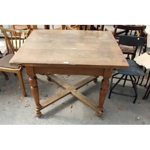 2568 - A CONTINENTAL MID 20TH CENTURY DINING TABLE WITH SINGLE DRAWER