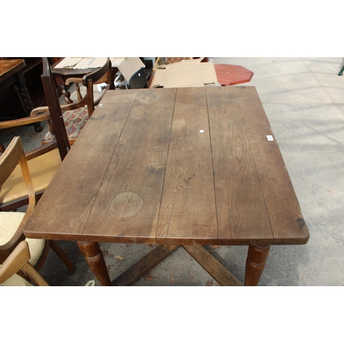 2568 - A CONTINENTAL MID 20TH CENTURY DINING TABLE WITH SINGLE DRAWER