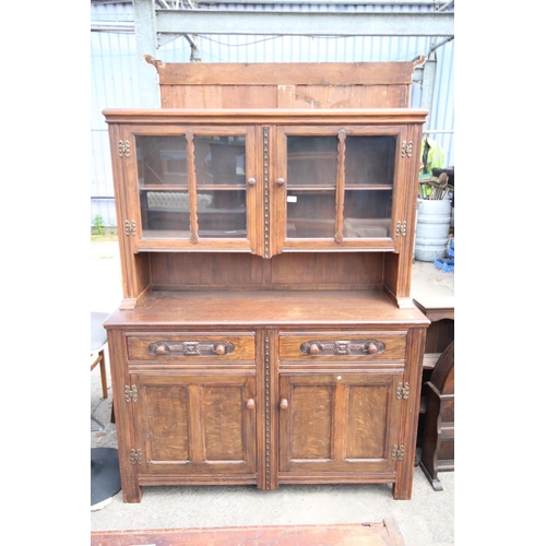 2576 - AN OAK AND BEECH E.GOMME FURNITURE DRESSER WITH GLAZED UPPER PORTION 55