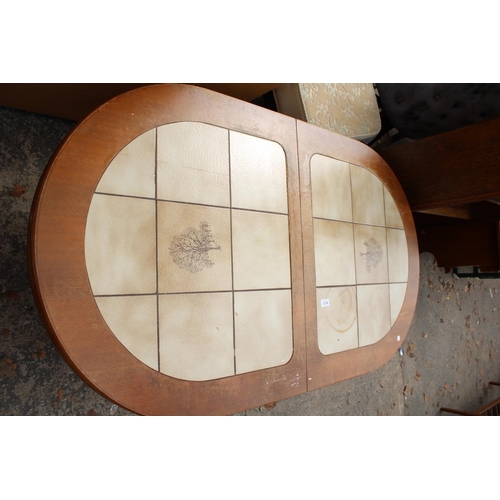 2734 - A RETRO TEAK EXTENDING COFFEE TABLE WITH TILED TOP BEARING GRABFIED MOBEL LABEL