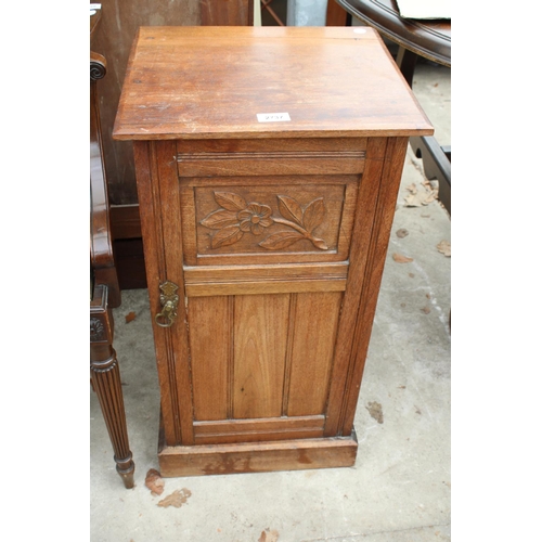 2737 - A LATE VICTORIAN MAHOGANY POT CUPBOARD WITH CARVED PANEL DOOR