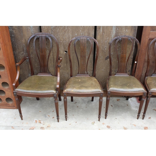 2738 - A SET OF SIX MAHOGANY HOOP BACK HEPPLEWHITE STYLE DINING CHAIRS ON TURNED AND FLUTED LEGS, TWO BEING... 