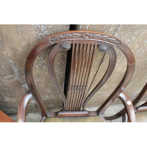 2738 - A SET OF SIX MAHOGANY HOOP BACK HEPPLEWHITE STYLE DINING CHAIRS ON TURNED AND FLUTED LEGS, TWO BEING... 