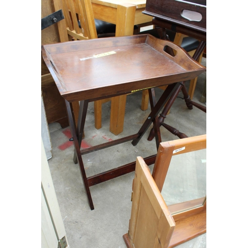 2754 - TWO GEORGIAN STYLE BUTLERS TRAYS ON FOLDING STANDS AND A PINE TRIPLE MIRROR