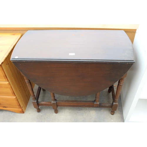 2770 - A MID 20TH CENTURY OVAL GATE-LEG TABLE